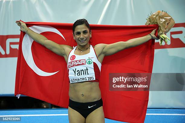 Nevin Yanit of Turkey celebrates winning gold in the Women's 60m Hurdles Final during day one of the European Athletics Indoor Championships at...