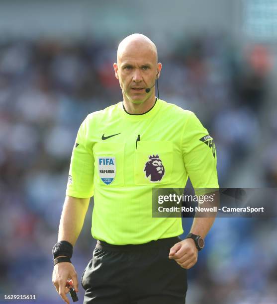 Referee Anthony Taylor during the Premier League match between Brighton & Hove Albion and West Ham United at American Express Community Stadium on...