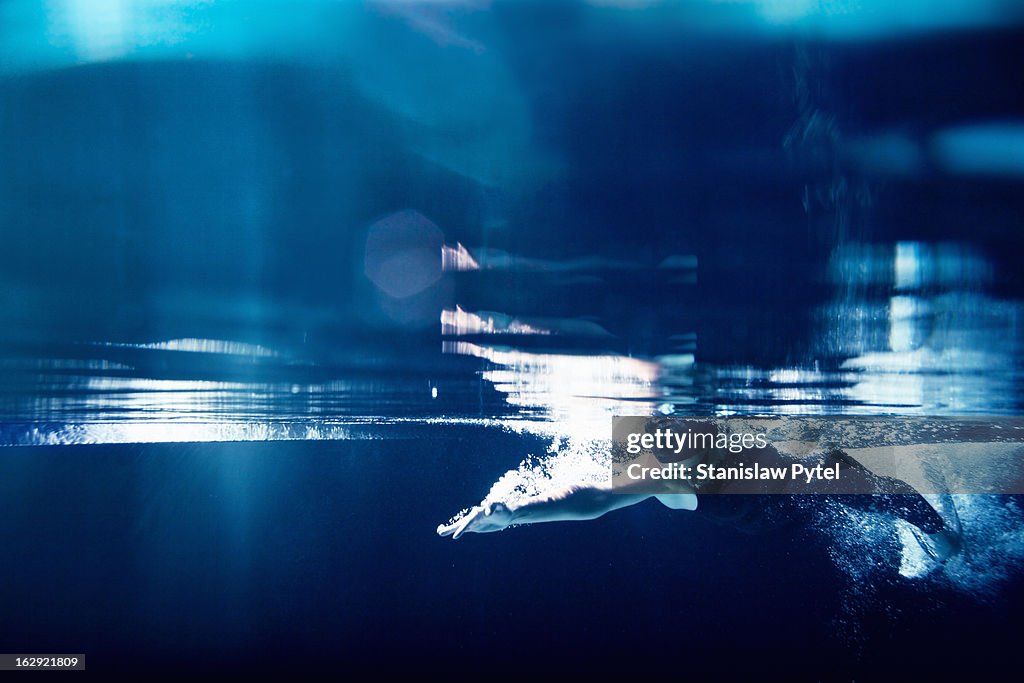 Swimmer underwater swimming freestyle