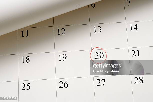 setting a date on calendar by red pen - number 20 stock pictures, royalty-free photos & images