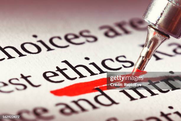 ethics is underscored heavily in a document: morality has relevance! - ethisch dilemma stockfoto's en -beelden
