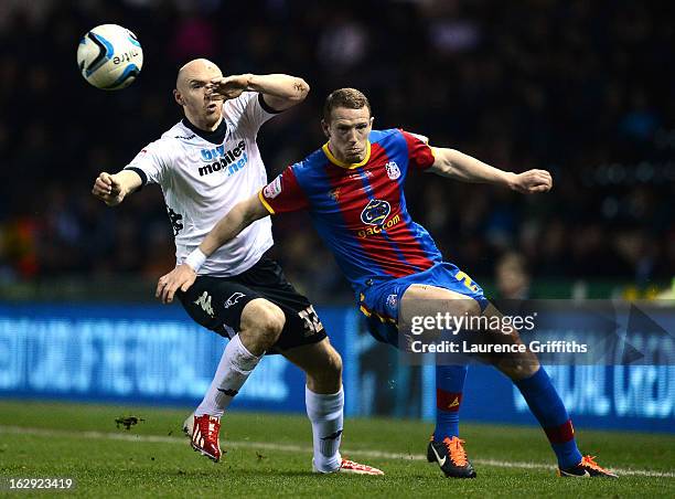 Connor Sammon of Derby County battles with Peter Ramage of Crystal Palace during the npower Championship match between Derby County and Crystal...