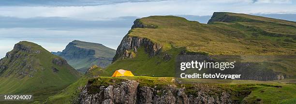 yellow dome tent in dramatic mountain wilderness highlands scotland - staffin stock pictures, royalty-free photos & images