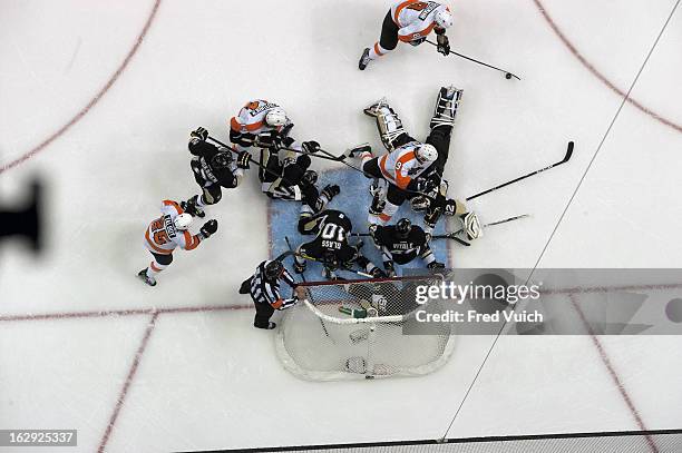 Aerial view of Philadelphia Flyers Nicklas Grossmann in action, scoring goal vs Pittsburgh Penguins goalie Tomas Vokoun and Joe Vitale at Consol...