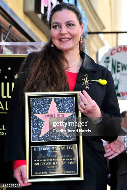 Maria Burton accepts the star posthumously at a ceremony honoring her father Richard Burton with a Star on the Hollywood Walk of Fame next to...