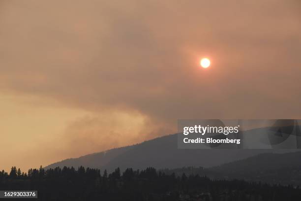 Smoke from the McDougall Creek wildfire in Kelowna, British Columbia, Canada, on Sunday, Aug. 27, 2023. British Columbia is experiencing the most...