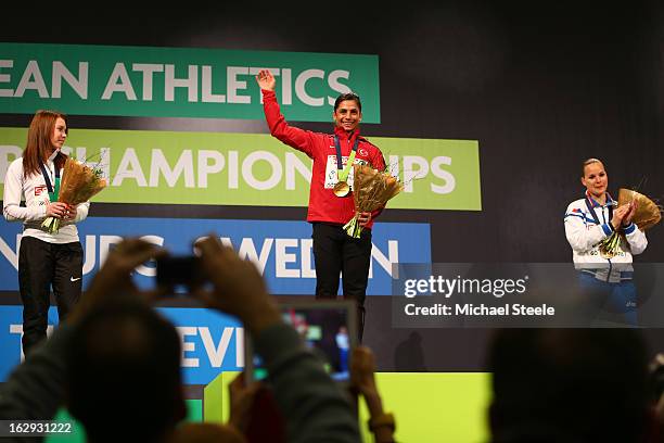 Silver medalist Alina Talay of Belarus, Gold medalist Nevin Yanit of Turkey and bronze Veronica Borsi of Italy pose during the victory ceremony for...