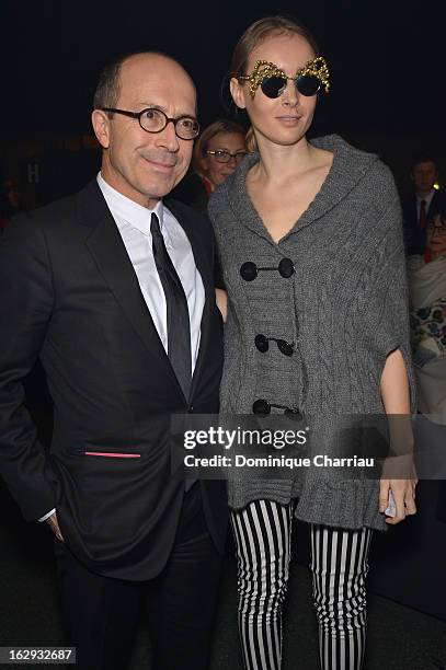 Jean-Marc Loubier and Olga Sorokina attend the Sonia Rykiel Fall/Winter 2013 Ready-to-Wear show as part of Paris Fashion Week at Halle Freyssinet on...