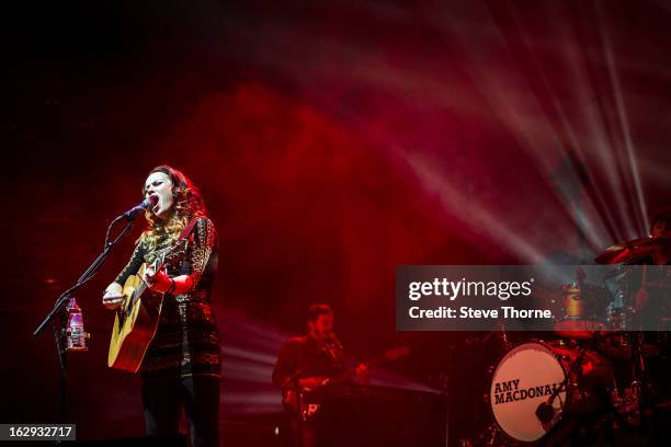 Amy MacDonald performs on stage in concert at Symphony Hall on March 1, 2013 in Birmingham, England.