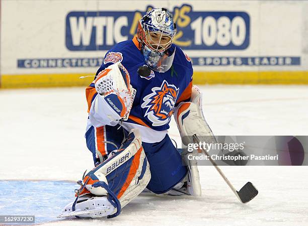 Rick DiPietro of the Bridgeport Sound Tigers makes a save prior to the game against the Connecticut Whale on March 1, 2013 at the XL Center in...