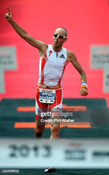 Bevan Docherty of New Zealand celebrates winning the New Zealand Ironman on March 2, 2013 in Taupo, New Zealand.