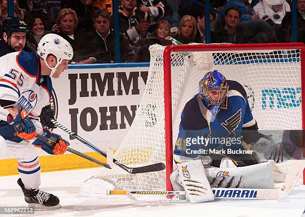 Jaroslav Halak of the St. Louis Blues makes a save on a shot from Ben Eager of the Edmonton Oilers in an NHL game on March 1, 2013 at Scottrade...