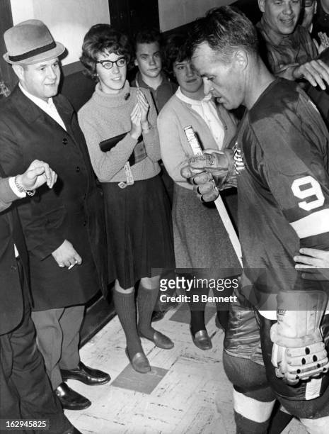 Gordie Howe of the Detroit Red Wings walks back to the dressing room after he scored the 545th goal of his career against the Montreal Canadiens on...