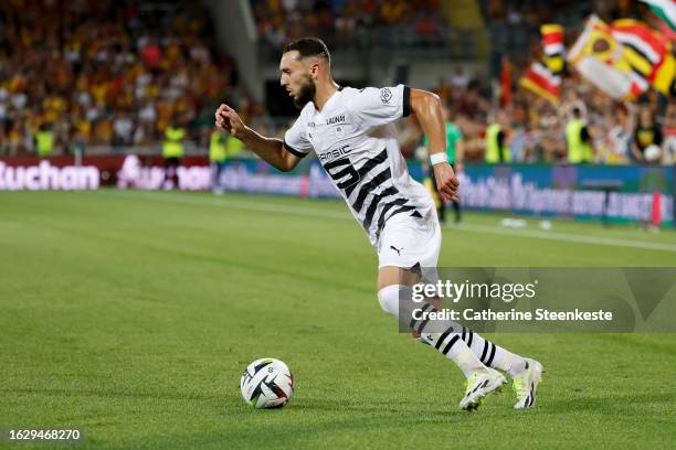 Amine Gouiri of Stade Rennais FC controls the ball during the Ligue 1 Uber Eats match between RC Lens and Stade Rennais FC at Stade Bollaert-Delelis...