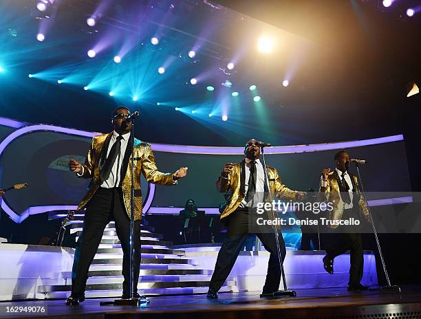 Nate Morris, Wanya Morris and Shawn Stockman of Boyz II Men perform at The Mirage Hotel & Casino at on March 1, 2013 in Las Vegas, Nevada.