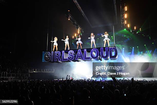 Kimberley Walsh, Nicola Roberts, Nadine Coyle, Cheryl Cole and Sarah Harding of Girls Aloud perform on their 'Ten - The Hits Tour' at The O2 Arena on...