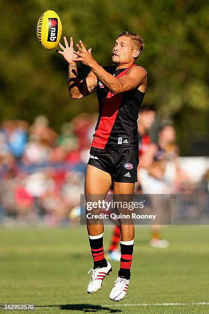 Leroy Jetta of the Bombers marks during the round two AFL NAB Cup match between the Essendon Bombers and the Richmond Tigers at Wangaratta...