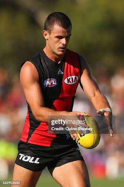 Brent Stanton of the Bombers kicks during the round two AFL NAB Cup match between the Essendon Bombers and the Richmond Tigers at Wangaratta...