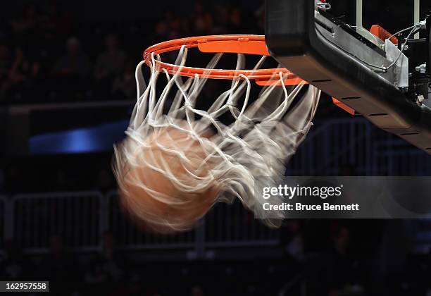 Generic view of a basketball going through the hoop during practice prior to the game between the Brooklyn Nets and the Dallas Mavericks at the...