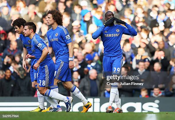 Demba Ba of Chelsea celebrates the opening goal during the Barclays Premier League match between Chelsea and West Bromwich Albion at Stamford Bridge...