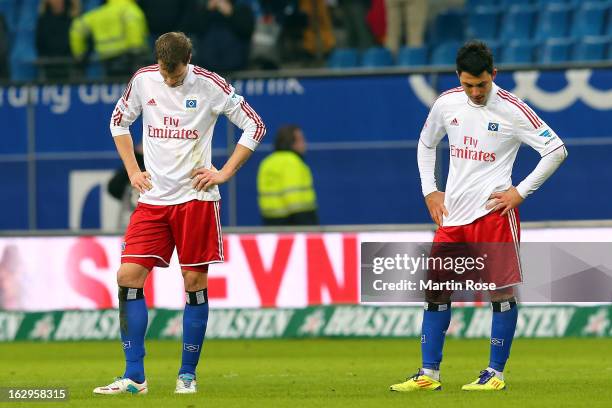 Marcell Jansen and Tolgay Arslan of Hamburger SV look dejected after the Bundesliga match between Hamburger SV and Greuther Fuert at Imtech Arena on...