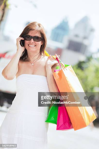urban female shopper hot summer day downtown montreal - montreal street stock pictures, royalty-free photos & images