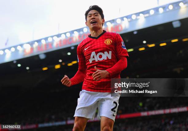 Shinji Kagawa of Manchester United celebrates scoring to make it 3-0 and claim a hat-trick during the Barclays Premier League match between...