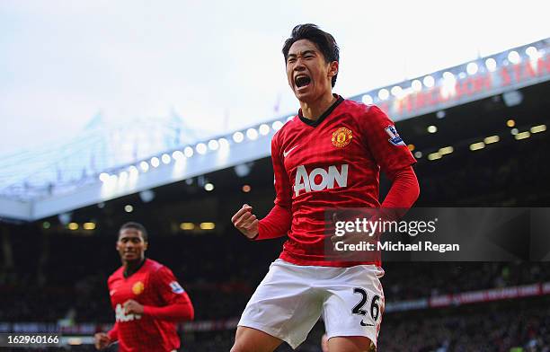 Shinji Kagawa of Manchester United celebrates scoring to make it 3-0 and claim a hat-trick during the Barclays Premier League match between...