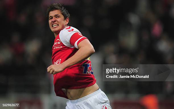 Anthony Weber of Stade de Reims Champagne celebrates victory during the Ligue 1 match between Stade de Reims Champagne v Paris Saint-Germain FC at...