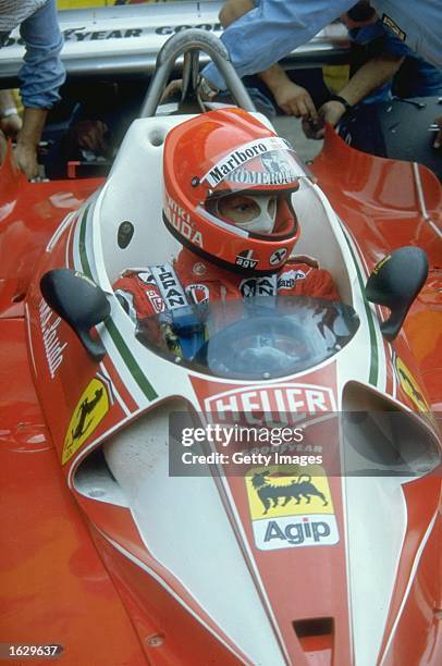 Portrait of Niki Lauda of Austria in his Scuderia Ferrari before the German Grand Prix at the Nurburgring circuit in Nuremberg, Germany. Lauda had an...