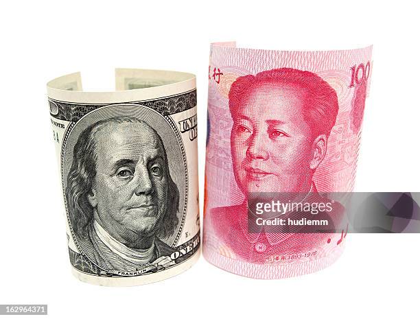 renminbi & u.s. dollar isolated on white background - chinese currency 個照片及圖片檔
