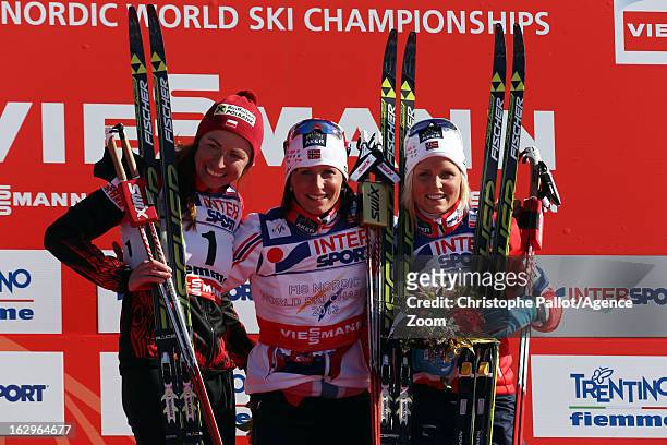 Marit Bjoergen of Norway takes the gold medal, Justyna Kowalczyk of Poland takes the silver medal, Therese Johaug of Norway takes the bronze medal...