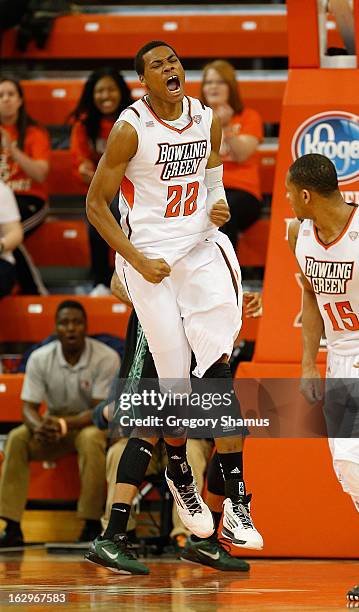 Richaun Holmes of the Bowling Green Falcons reacts after a first-half dunk while playing the Ohio Bobcats at the Stroh Center on March 2, 2013 in...