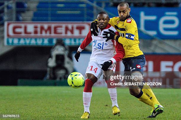 Sochaux' Malian defender Cedric Kante vies with Nancy's Cameroonian forward Paul Alo'o Efoulou during their French L1 football match Sochaux versus...