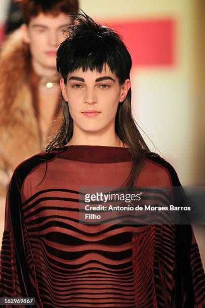 Model walks the runway during the Jean Paul Gaultier Fall/Winter 2013 Ready-to-Wear show as part of Paris Fashion Week on March 2, 2013 in Paris,...