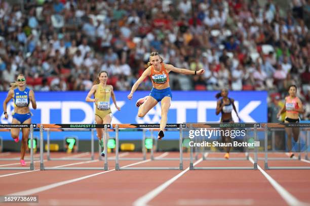 Femke Bol of Team Netherlands competes in Heat 4 of Women's 400m Hurdles Qualification during day three of the World Athletics Championships Budapest...