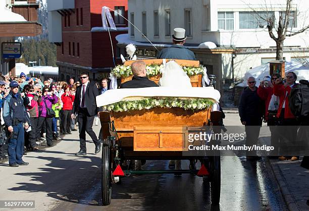 Laura Bechtolsheimer arrives at the Protestant Church in a horse drawn carriage for her wedding to Mark Tomlinson on March 2, 2013 in Arosa,...