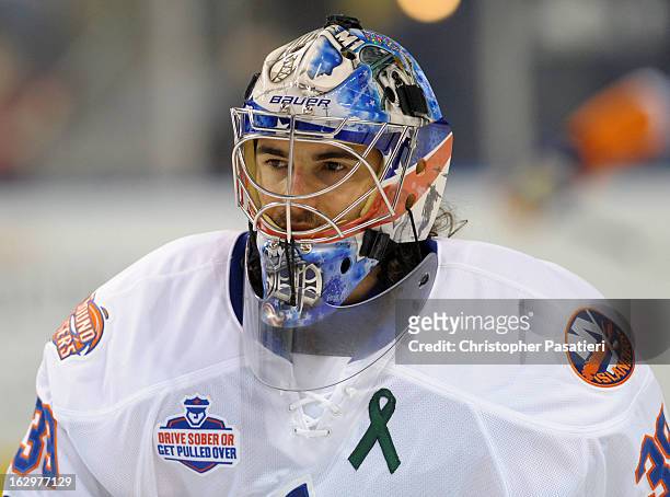 Rick DiPietro of the Bridgeport Sound Tigers looks on prior to an American Hockey League game against the Adirondack Phantoms on March 2, 2013 at the...