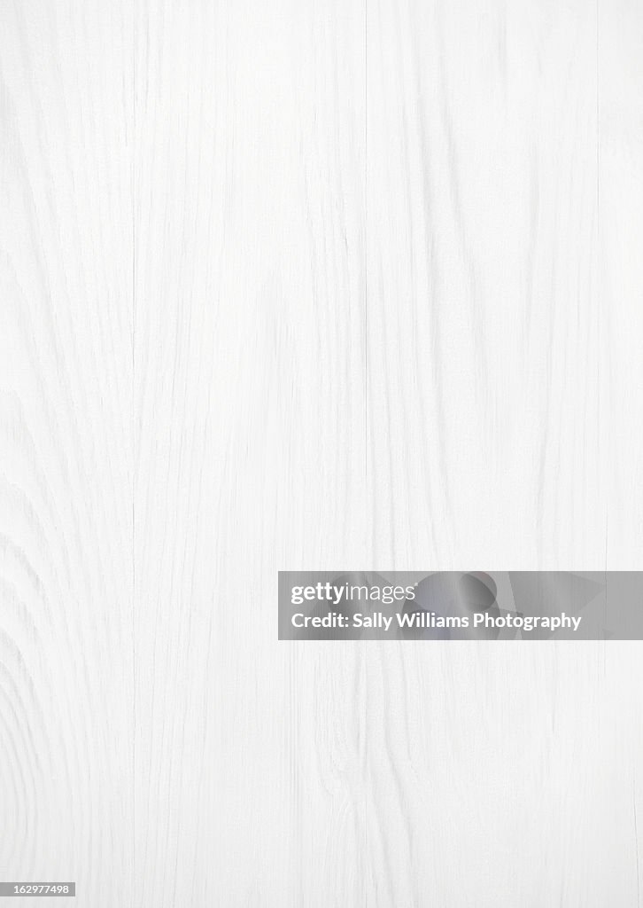 A painted white wooden tabletop background