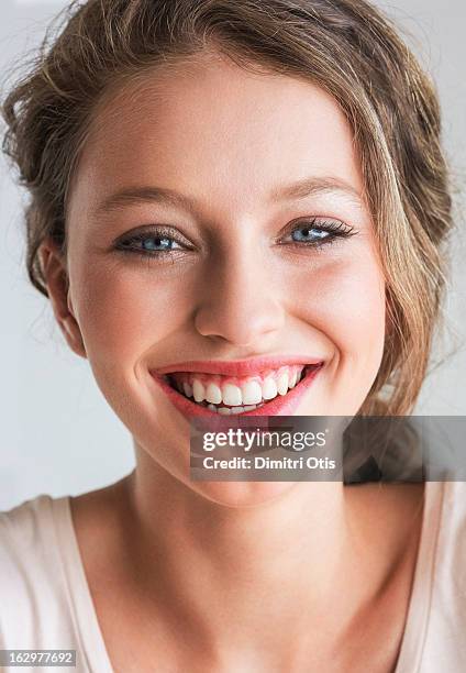 portrait of young woman, laughing - 16 17 girl blond hair stock pictures, royalty-free photos & images