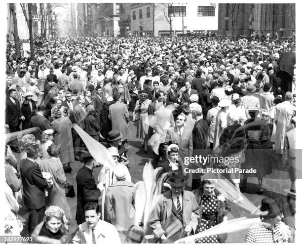Easter Sunday views in front of St Patrick's Cathedral showing Easter Parade in full progress in New York City, 4/17/60.