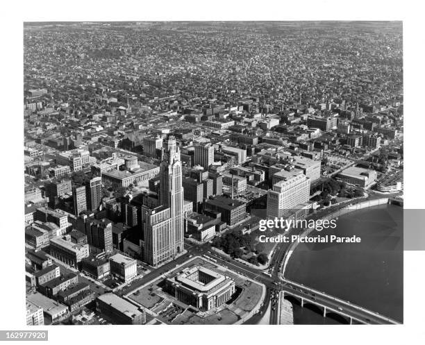 Aerial view of downtown Columbus, Ohio, looking southeast. City Hall, LeVeque-Lincoln Tower and Departments of State Building in the foreground, 1955.