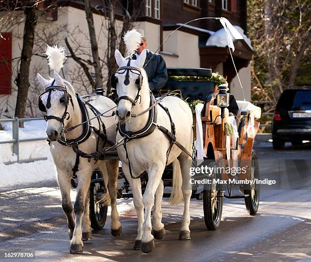 Horse drawn carriage carrying Laura Bechtolsheimer arrives at the Protestant Church for her wedding to Mark Tomlinson on March 2, 2013 in Arosa,...