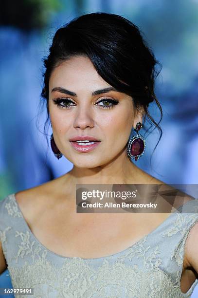 Actress Mila Kunis arrives at the Los Angeles Premiere of "Oz The Great and Powerful" at the El Capitan Theatre on February 13, 2013 in Hollywood,...