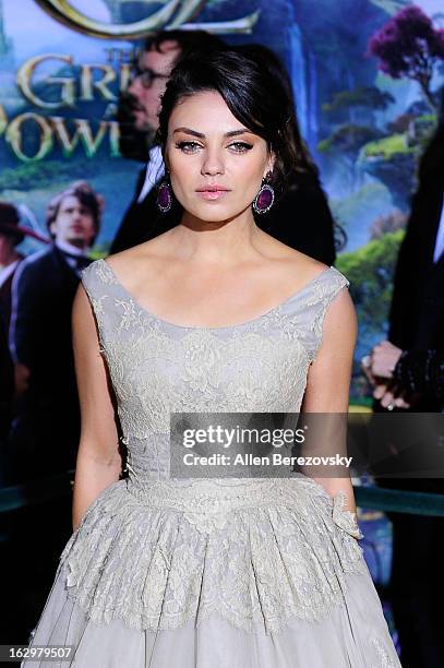 Actress Mila Kunis arrives at the Los Angeles Premiere of "Oz The Great and Powerful" at the El Capitan Theatre on February 13, 2013 in Hollywood,...