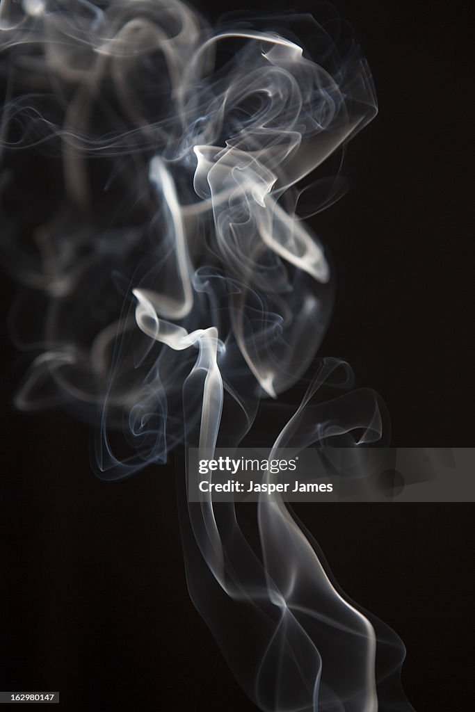 Smoke trail against black background