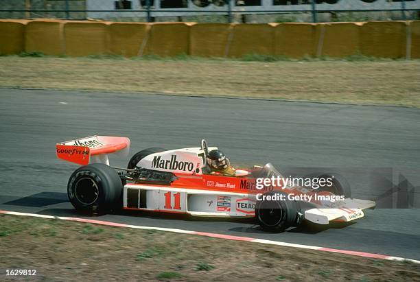 James Hunt of Great Britain in action in his McLaren Ford during the Japanese Grand Prix at the Mount Fuji circuit in Japan. Hunt finished in third...