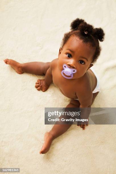 Baby Diaper Pacifier Photos and Premium High Res Pictures - Getty Images
