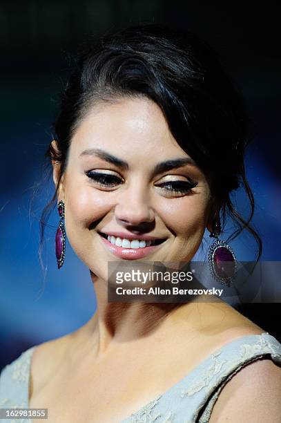 Actress Mila Kunis arrives at the Los Angeles Premiere of "Oz The Great and Powerful" at the El Capitan Theatre on February 13, 2013 in Hollywood,...