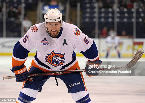 Jack Combs of the Bridgeport Sound Tigers waits for a face off during an American Hockey League game against the Adirondack Phantoms on March 2, 2013...